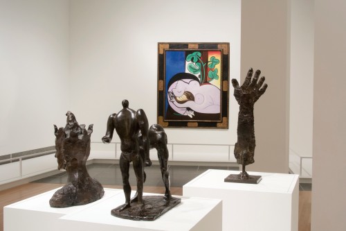 Transfigurations (installation view). Picasso's painting Nu au fauteuil noir and sculptures Le bras, Le centaure and Le Fou. Courtesy of the Wexner Center.